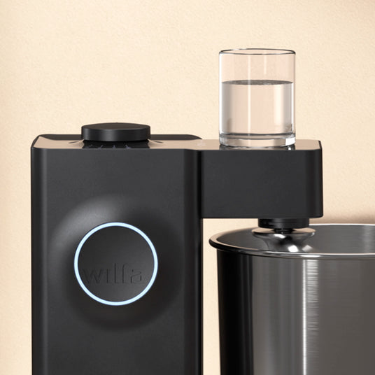 Probaker with glas of water on the top of it - showing its stability