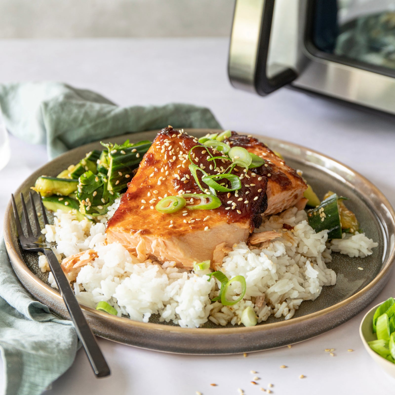 Teriyaki salmon with sweet and sour cucumber salad