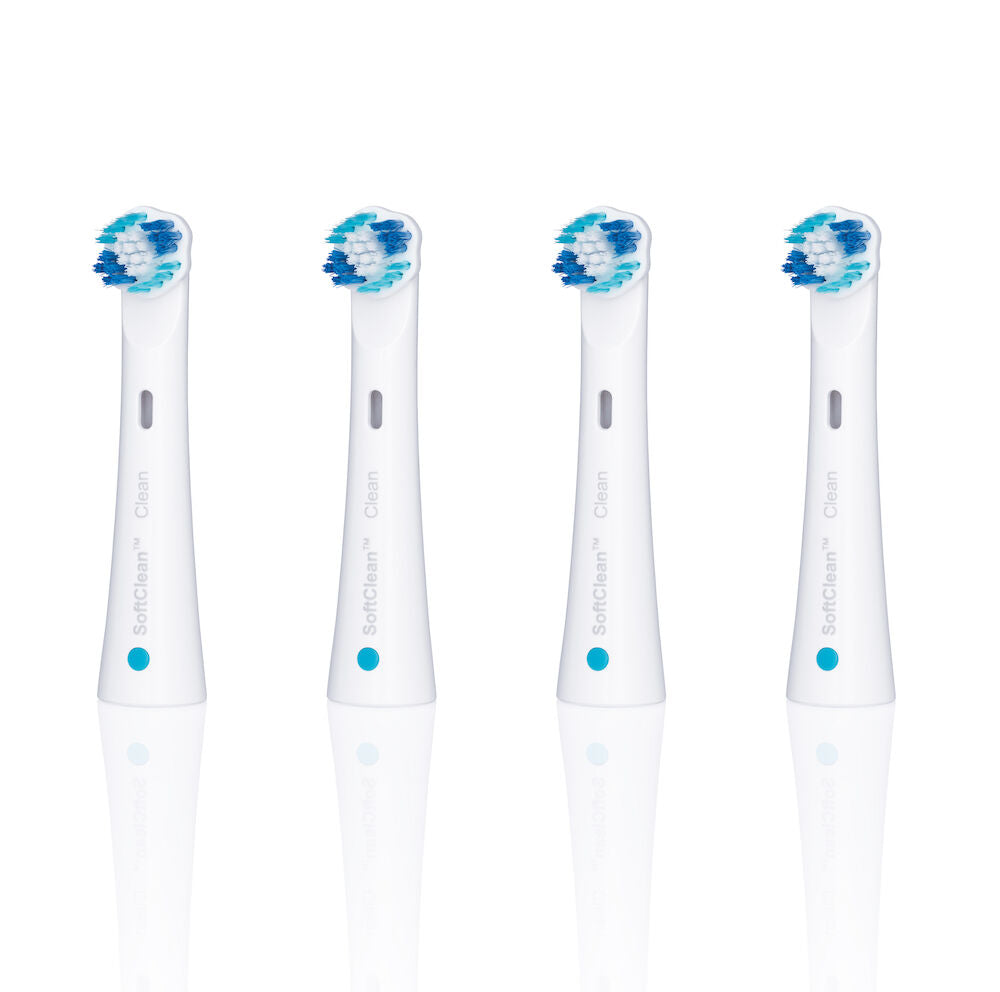 Four white toothbrush heads with blue and green bristles are lined up vertically against a white background. These CLEAN 4PK toothbrush heads feature a small blue dot near the base, alongside visible reflections below.