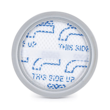 Close-up of a round, gray-framed, disposable dust container filter. The center features a white mesh with blue circular patterns and the text "THIS SIDE UP" repeated multiple times. The design indicates the proper orientation for placing or installing the INNOVAC DUSTBIN FILTER.