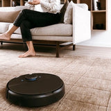 A black INNOBOT RVC-D4000SL vacuum cleaner with strong suction power is pictured against a white background. Above it, there are two award badges: one from L3home indicating "Excellent" with a 4-star rating, and another marked "Testvinnare" indicating it is an award winner.